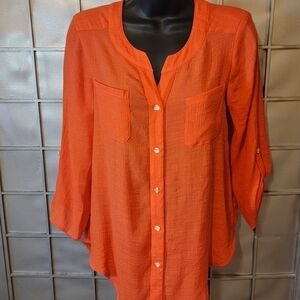Alyx size small button down orange blouse.